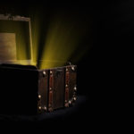 Treasure Chest with Light Coming Out of It