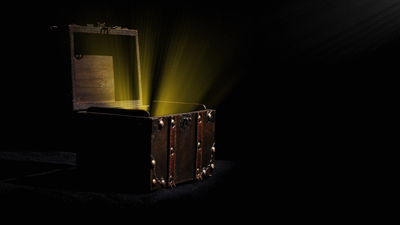 Treasure Chest with Light Coming Out of It